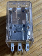 Potter & Brumfield DPDT relay, P/N R30D-E1-X2-12VDC, 12 VDC coil.