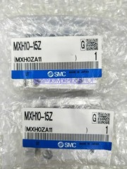 ONE New SMC MXH10-15Z pneumatic slide